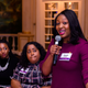 Michigan state Representative Sarah Anthony, right, asks a question during an afternoon session at the YEO Women’s Conference. Anthony has prioritized fighting voter suppression efforts in her state.